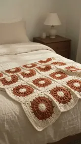 Rust and Cream Wheel-Motif Throw: Layout and Border Samples — AI-generated design illustration